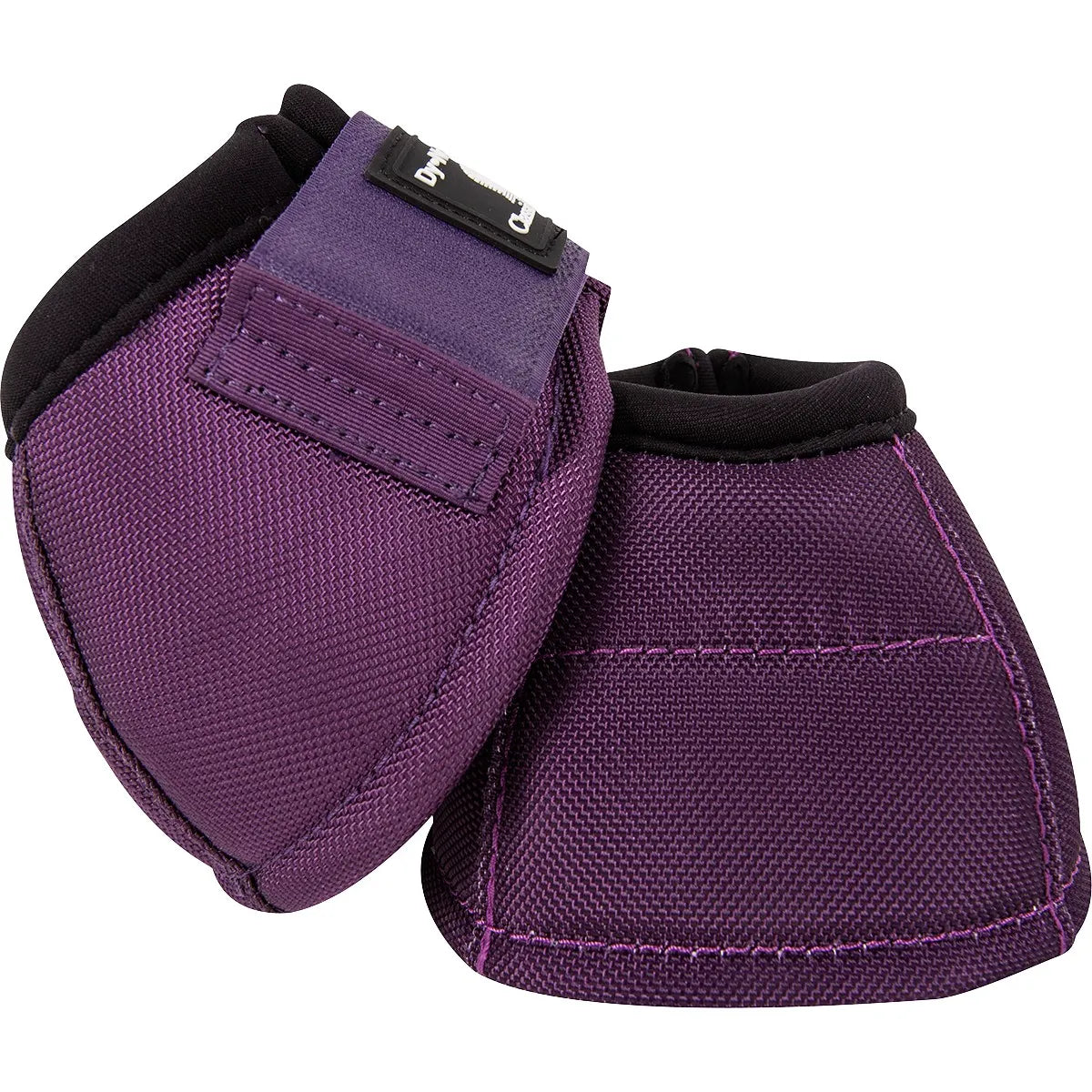 Classic Equine Dyno Bell Boots in vibrant purple, offering heavy-duty hoof protection for horses. Features a water-repellent nylon outer shell, secure hook-and-loop closure, and padded collar to prevent overreaching and injury. These high-quality equestrian bell boots are perfect for performance, training, or turnout. Ultimate protective gear for your horse's hooves.