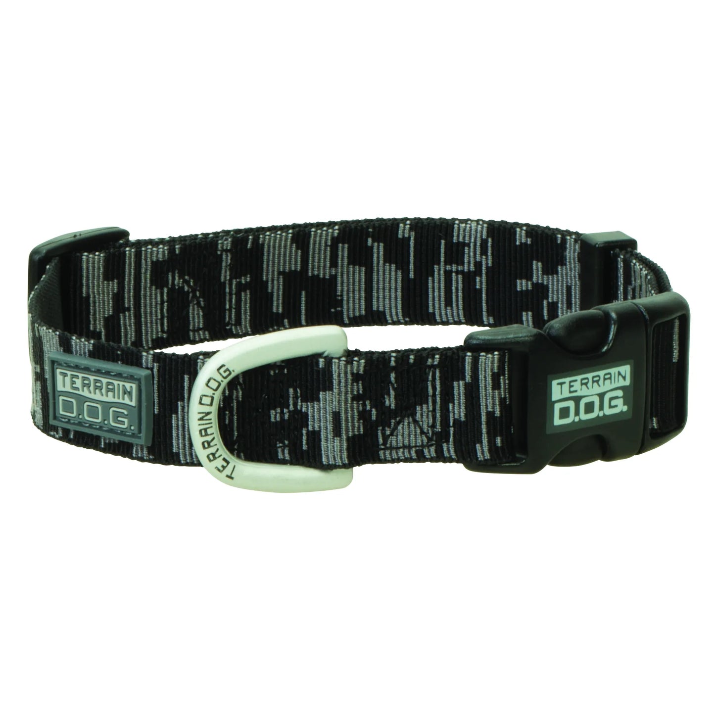Weaver Leather Terrain D.O.G. adjustable dog collar in a stylish black and grey digital camo pattern. This durable nylon webbing pet accessory features a heavy-duty side-release buckle, a grey rubber logo patch, and a distinctive white metal D-ring engraved with "TERRAIN D.O.G." for secure leash attachment. A rugged, comfortable, and high-performance dog collar designed for outdoor adventures and active lifestyles.