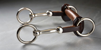 A Classic Equine moon bit with its distinct curved shanks and a sweet iron mouthpiece.