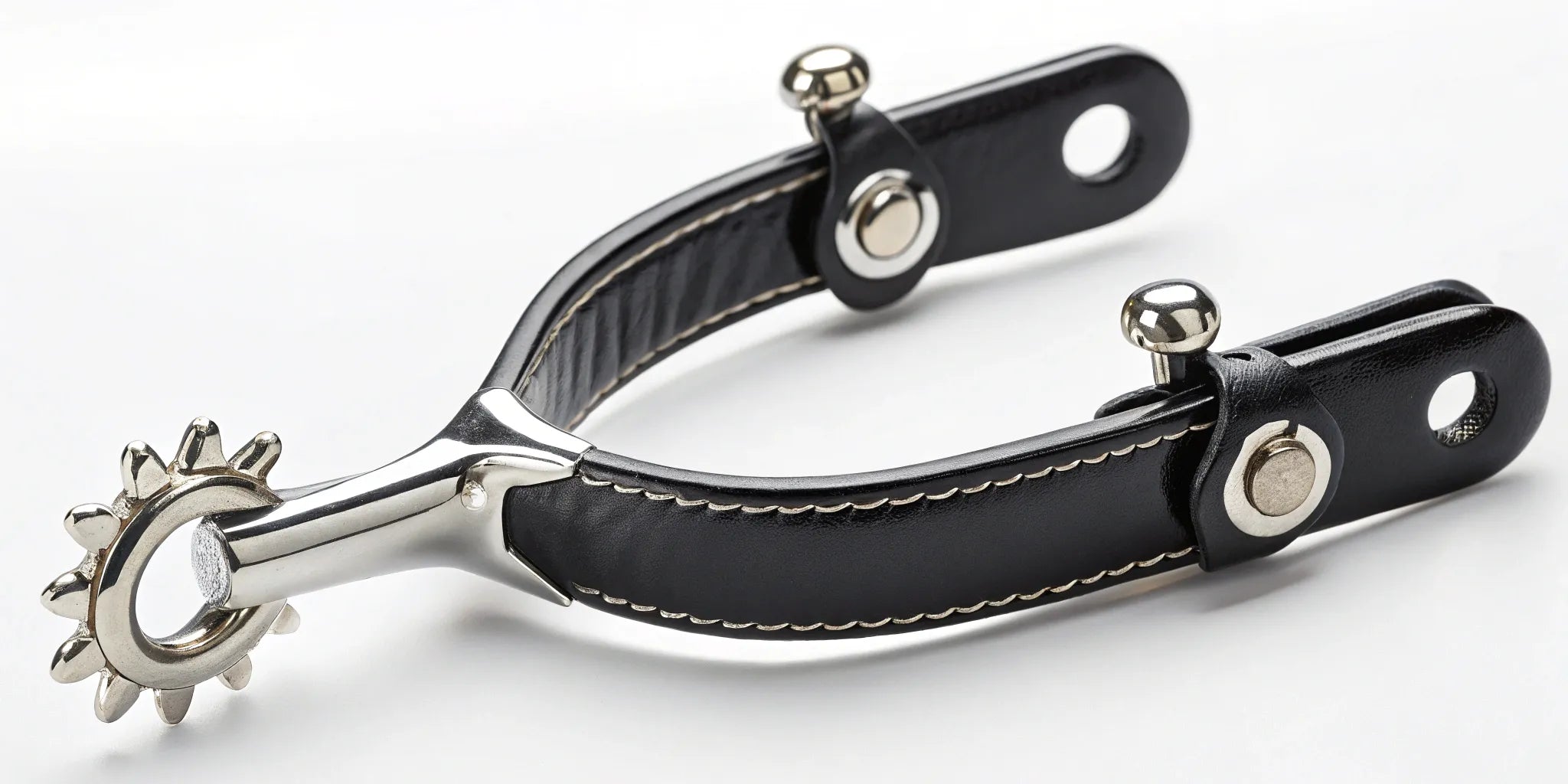 A pair of stainless steel equestrian rowel spurs for sale.