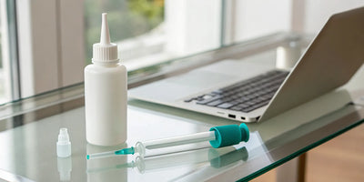 Syringe of ivermectin paste for horses, available for sale online.