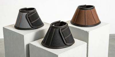Durable horse bell boots for sale in various styles with secure closures.