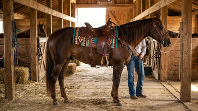 Woven wool saddle pad under a western saddle