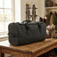 Lifestyle photo of Shires Aubrion React Holdall - Black Durable Equestrian Gear & Travel Bag