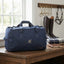 Lifestyle photo of Shires Aubrion Equestrian Holdall - Navy Blue Durable Riding Gear & Travel Bag