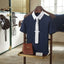 Lifestyle photo of Shires Aubrion Optima MX Men's Zip-Front Show Shirt - Technical Performance Equestrian Riding Apparel