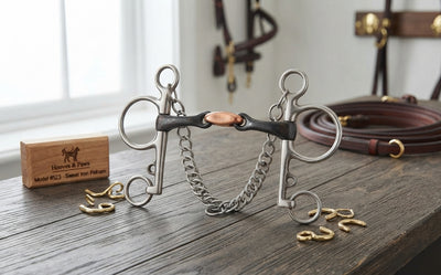 Lifestyle photo of Shires Double Jointed Sweet Iron Pelham Horse Bit #523 - Sweet Iron Mouthpiece with Copper Ribs
