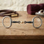 Lifestyle photo of Shires Flat Eggbutt Snaffle Horse Bit with Lozenge Mouthpiece - Blue Sweet Iron
