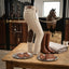 Lifestyle photo of Shires Aubrion Suffolk Childs Breeches - Beige Cotton Lycra with Clarino Knee Patches and Euro Seat