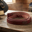 Lifestyle photo of Professional's Choice Latigo and Harness Leather Cinch Tie Straps | 1¾” x 5 ½’ Burgundy