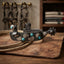 Lifestyle photo of Professional's Choice Turquoise Feather Western Spurs - 1" Band, 1 3/4" Shank, 8-Point Rowel