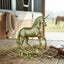 Lifestyle photo of Breyer Unicorn Treasures Stablemates 1:32 Scale Model Horse #6928 - Peridot Gemstone Hue, 3-3.5"