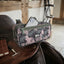 Lifestyle photo of Cashel Designer Small Pommel Bag - Camo Pattern Saddle Accessory with Smartphone Pocket