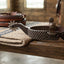 Lifestyle photo of Classic Equine Rasp Reiner Spurs - Weighted 1-inch Band and 2-inch Raised Shank - Traditional Western Style