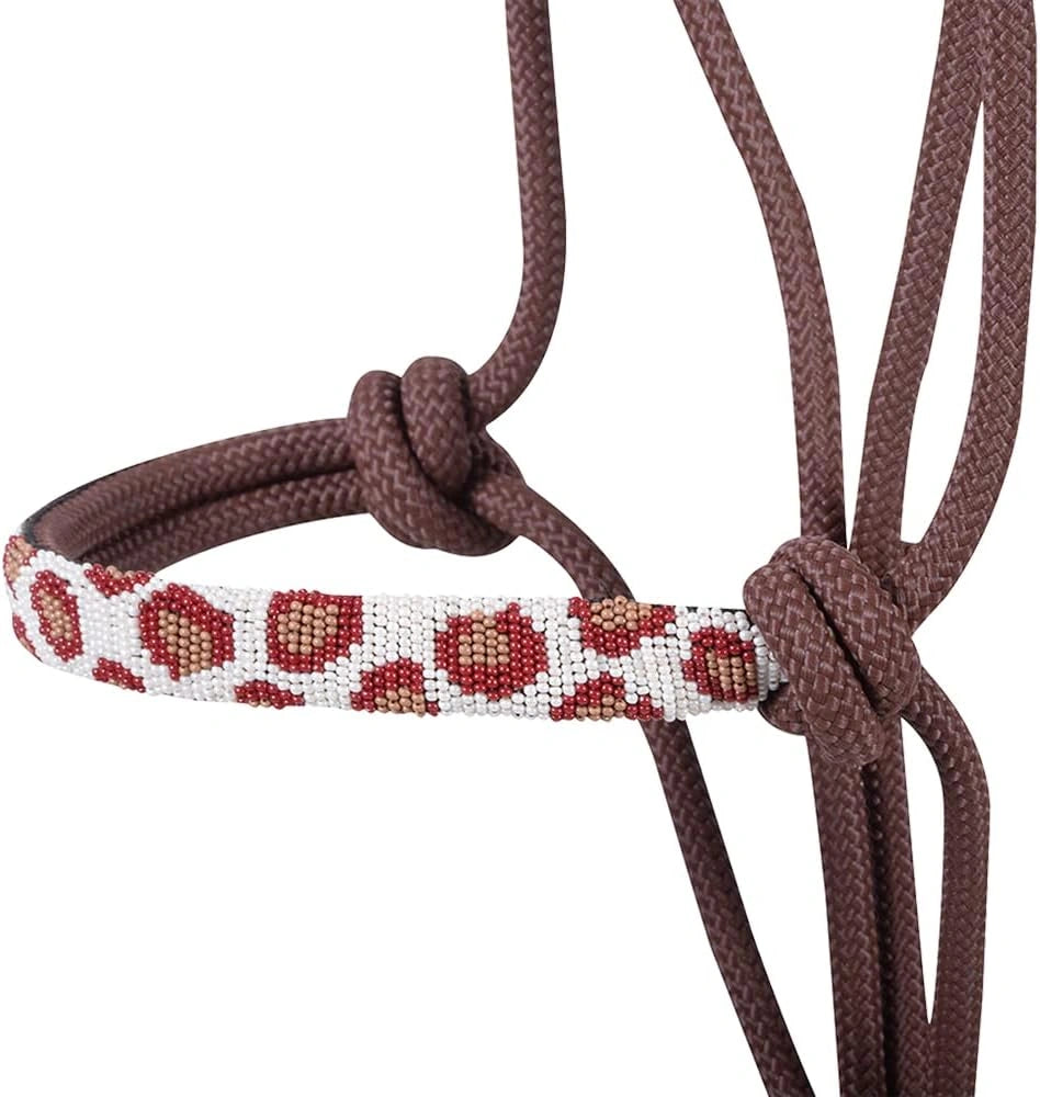 Bracelet with red and white pattern on a brown cord against a white background