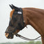 Profile of a chestnut horse wearing a black Cashel Quiet Ride Fly Mask with ear and nose coverage. Designed for riding, this transparent mesh mask fits comfortably over a bridle to protect against flies and insects. This durable equestrian accessory ensures a peaceful trail ride by keeping bugs away from sensitive areas like the eyes, muzzle, and ears. Perfect for summer fly protection and bug-free riding.