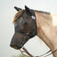 Cashel Quiet Ride Fly Mask in black with long nose and ears, shown fitted over a bridle on a horse. This lightweight, translucent mesh riding fly mask provides superior insect protection for trail rides and arena work without obstructing vision. Featuring a secure fit and comfortable design, it’s the perfect equestrian accessory for bug-free summer riding.