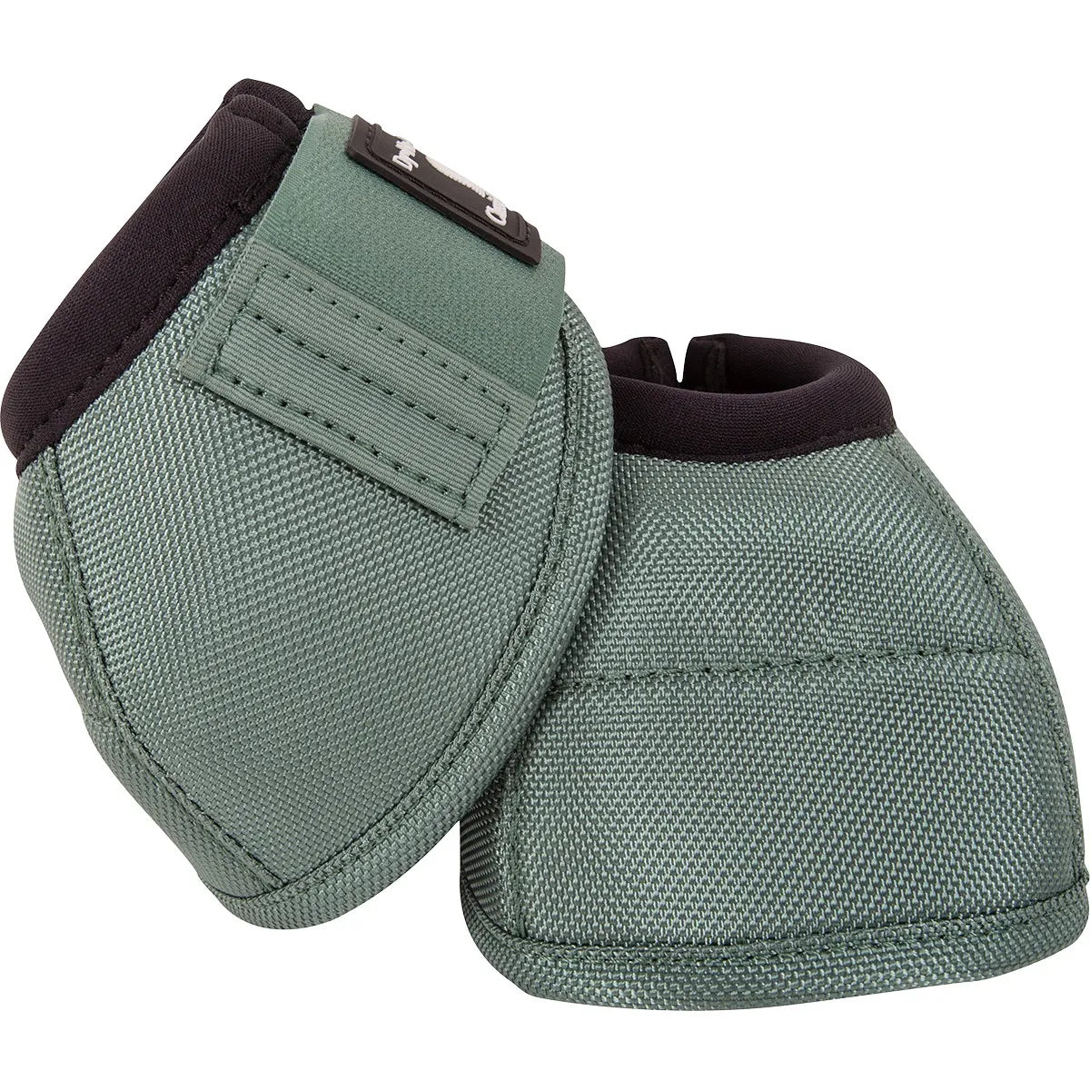 Classic Equine Dyno Bell Boots in a stylish Sage Green. These durable horse bell boots feature a heavy-duty ballistic nylon outer shell and a soft black neoprene lining for maximum hoof protection and comfort. The secure hook-and-loop closure and contoured fit prevent spinning, making them ideal for performance, trail riding, or turnout. High-quality equestrian gear designed to protect against overreach injuries while looking great.