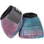 Classic Equine Dyno No Turn Bell Boots featuring a vibrant iridescent pink and teal crocodile scale print. These high-quality horse boots provide superior hoof protection with a durable outer shell, soft black neoprene lining, and secure grey Velcro straps. Ideal for equestrians looking for stylish and functional horse gear with a fun, colorful pattern for schooling, competition, or turnout.