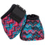 Classic Equine Dyno Bell Boots in a vibrant pink, turquoise, and black zigzag pattern. These durable horse overreach boots feature a secure black hook-and-loop strap and heavy-duty construction for superior hoof and coronet band protection. A stylish addition to any equestrian tack collection, these Southwestern-inspired boots combine bold patterns with professional-grade performance for the arena or trail.
