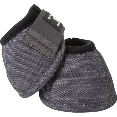 Classic Equine Dynohide 2520D No Turn Horse Overreach Bell Boots in charcoal gray. These durable ballistic nylon bell boots feature a heavy-duty, puncture-resistant outer shell and a soft black neoprene lining at the rim for comfort. The secure hook-and-loop closure tab ensures a stay-put fit. Designed for maximum hoof and coronary band protection, these equestrian boots prevent overreach injuries during performance riding or turnout.