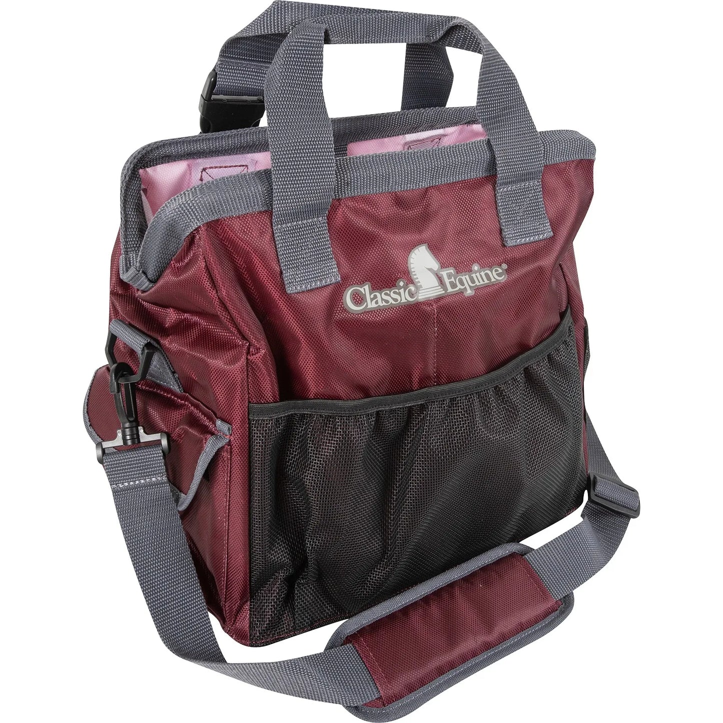 Classic Equine Groom Tote in a deep maroon burgundy with grey trim. This durable horse grooming bag features multiple mesh exterior pockets for organization, a spacious pink-lined interior, sturdy top handles, and an adjustable padded shoulder strap. Ideal for organizing equestrian supplies, brushes, and horse care essentials at the barn or show.