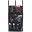 Classic Equine Hanging Groom Case in black, featuring three tiers of mesh pockets for organized barn storage. The top row holds horse brushes and protective boots, while the bottom rows store spray bottles, a grooming comb, and cloths. This durable equestrian organizer includes adjustable hanging straps with buckles and D-rings for easy mounting in stables or trailers. Ideal for keeping horse grooming essentials tidy and accessible.