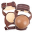 Classic Equine Leather Skid Boots in rich dark brown featuring tan shock-absorbing cups embossed with horse head logos. These professional-grade horse boots include durable leather straps with silver buckles, white contrast stitching, and a contoured fit to provide superior fetlock protection during slides and stops. Ideal for reining, roping, and western performance horses seeking high-quality protective gear.