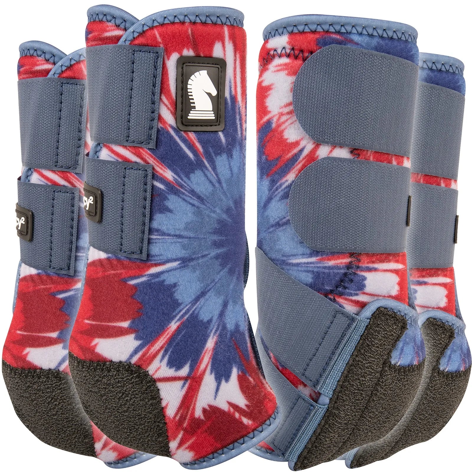 Classic Equine Legacy2 Fireworks Horse Medicine SMB Sport Boots 4 Pack featuring a vibrant red, white, and blue tie-dye design. These protective front and hind horse boots include shock-absorbing cradle systems, secure hook-and-loop closures, and durable reinforced bottoms. Perfect for equestrian support during barrel racing or competition, these patriotic sport boots offer a stylish, high-performance fit for total leg protection.