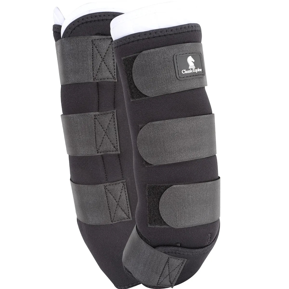 A pair of black Classic Equine Quick Wraps designed for easy liniment application and horse leg protection. These durable equine bandages feature three secure hook-and-loop straps across the cannon bone and an angled fetlock strap. Each wrap includes a soft, removable white inner liner for maximum comfort and support during recovery or transport. High-quality neoprene-like material with the Classic Equine logo, ideal for daily equestrian care and post-workout leg support.