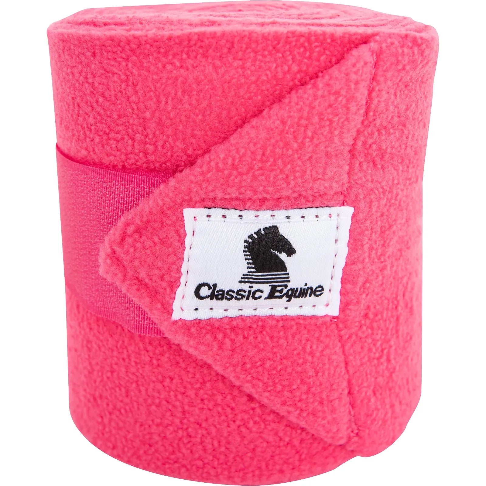Classic Equine bright pink polo wraps for ultimate horse leg protection. These soft, high-quality fleece equestrian leg wraps feature a secure Velcro fastener and the signature white Classic Equine brand logo with a horse head silhouette. Ideal for providing support and protection during exercise, training, or trail riding. A vibrant and functional addition to any horse grooming kit or equestrian gear collection.