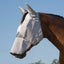 Cashel Crusader Sun Fly Mask in grey on a bay horse, providing full-face protection. This durable horse fly mask features integrated ear covers and a long nose extension for maximum UV and fly protection. The breathable mesh design ensures comfort while shielding sensitive areas from pests and sun damage. Ideal for summer horse care, this protective equestrian gear is a top choice for pasture-grazing horses.