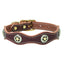 Lone Star Legend Sunset Collar crafted from premium dark burgundy leather with unique scalloped edges and white contrast stitching. This Western-style dog collar features ornate silver and gold star conchos and durable gold-toned buckle hardware. A stylish, handcrafted accessory for your pet, blending rugged durability with classic Texas-inspired design. Perfect for pet owners looking for designer, high-quality leather dog gear.