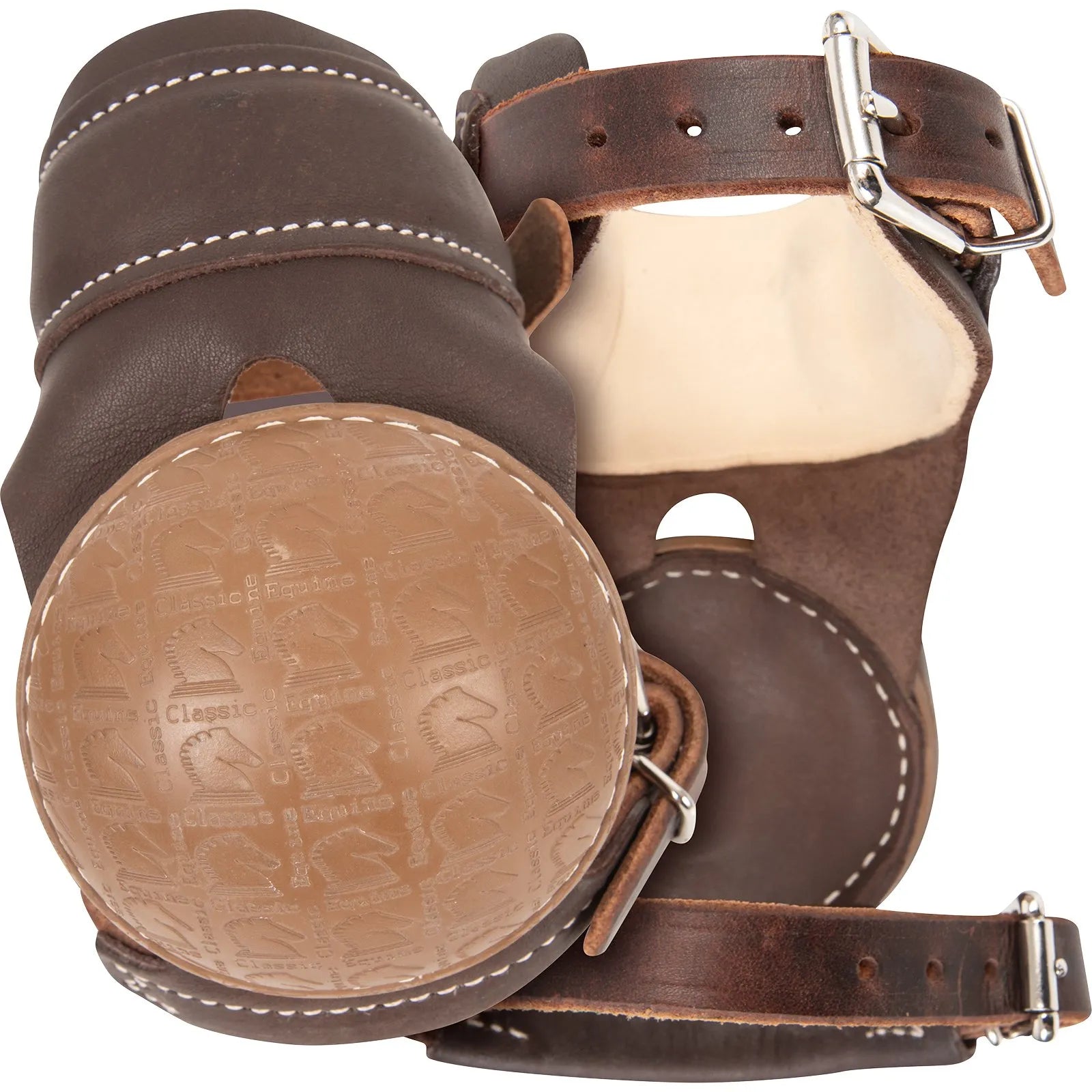Martin Saddlery Pro Skid Boots in chocolate brown leather with white contrast stitching. These professional horse protection boots feature a durable tan outer cup embossed with horse logos, designed for fetlock safety during reining and roping. Includes adjustable leather straps with silver buckles for a secure fit. Ideal performance equestrian gear for sliding stops and hind leg protection.
