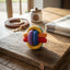 Lifestyle photo of Jojio Knot Ball Tug and Play Dog Toy - Durable Woven Cotton Rope for Dental Health, Fetch, and Tug