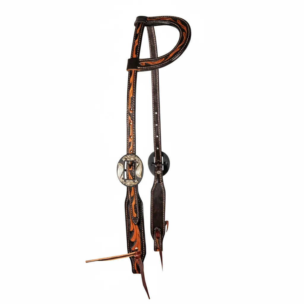 Professional's Choice Floral One-Ear Headstall crafted from premium dark leather with hand-carved light chestnut floral tooling. This elegant western horse headstall features an ornate silver engraved buckle set and traditional lace tie bit ends. A high-quality piece of tack designed for durability and a classic western look, perfect for horse shows, ranch work, or trail riding.