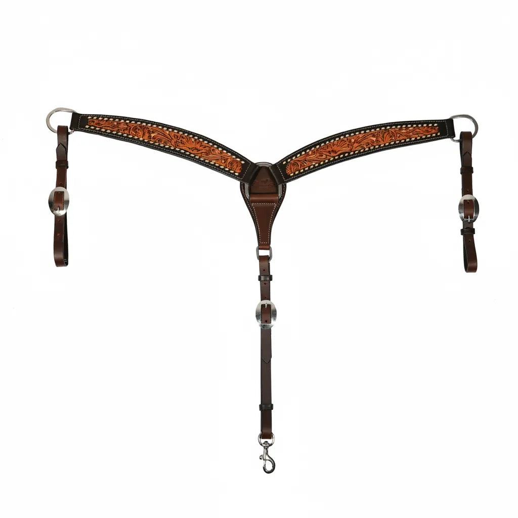 Professional's Choice Buckstitched Filigree Leather Breast Collar in Black/Natural. This 2-inch wide western horse breastplate features hand-tooled floral filigree and white buckstitching. Polished silver hardware and adjustable straps with a center snap ensure a secure fit for average horses. High-quality leather horse tack for western riding, barrel racing, and performance.