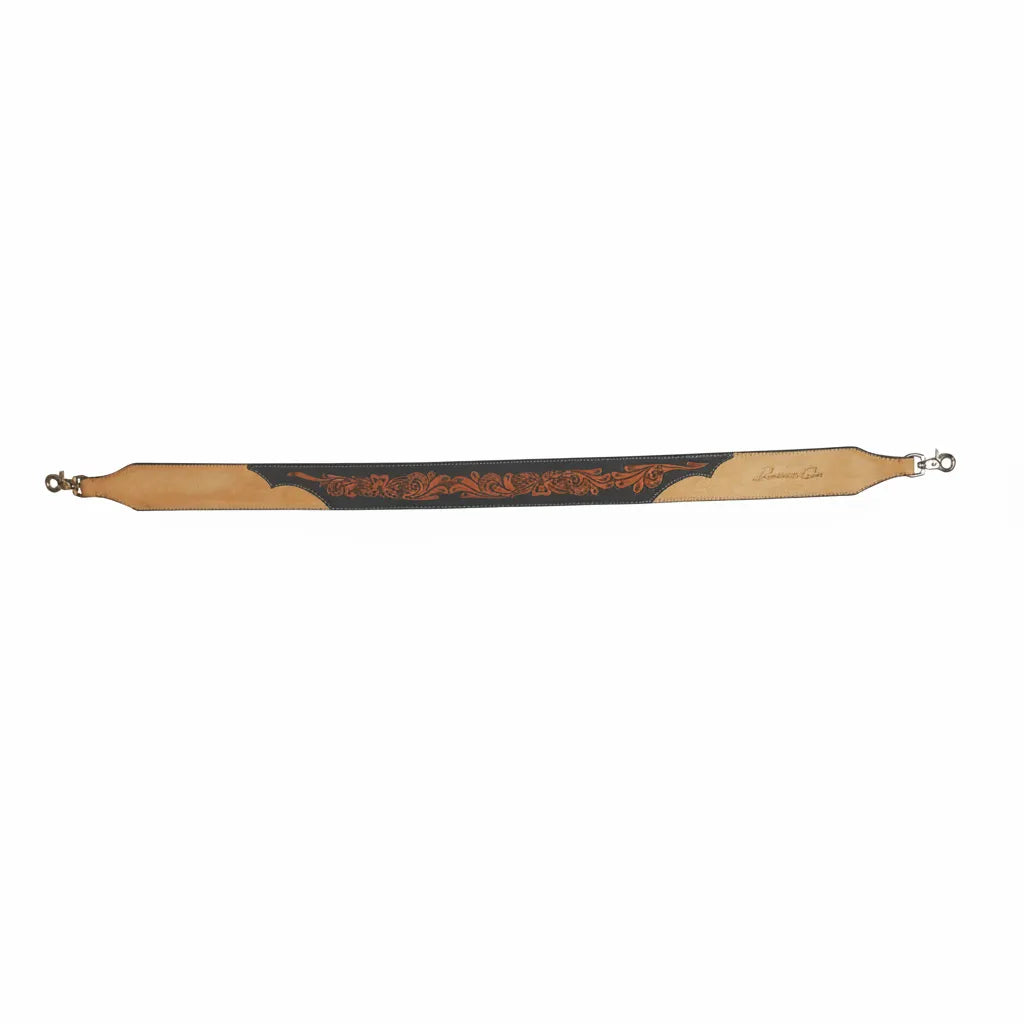 Professional's Choice Roughout Floral Black Leather Rope Can Strap featuring intricate floral tooling on a black leather center inlay. This 38-42 inch Western accessory is crafted from high-quality natural tan leather with durable silver metal snap hooks at both ends. Perfect for securing rope cans or bags, this hand-tooled strap combines traditional ranch style with practical function for ropers and trail riders.