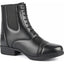 Shires Moretta Anita Women's Synthetic Leather Paddock Riding Boots in classic black. These equestrian boots feature a sophisticated mock lace front, decorative toe cap detail, and flexible elastic side panels for comfort. Crafted from durable synthetic leather with a WickAway moisture-wicking lining and convenient rear zipper. Ideal for horse riding and stable chores, these stylish ankle boots offer a traditional look with modern, easy-care materials.