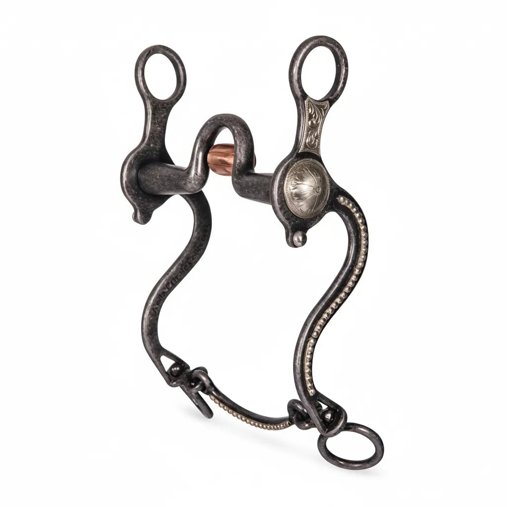 Professional's Choice Bob Avila Woodside Medium Port Roller Bit featuring 8-inch curved sweet iron shanks with engraved silver conchos and beaded floral accents. The 5-inch mouthpiece has a medium port with a rotating copper roller to encourage salivation and responsiveness. This professional-grade Western horse bit combines an antique finish with ornate silver detailing, perfect for refined communication and classic show ring style.
