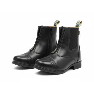 Shires Moretta Clio Plus child’s paddock boots in black leather, featuring a front-zip closure and decorative punched-toe cap detail. These durable equestrian riding boots include elastic side panels and branded pull tabs for easy on-and-off. Ideal for young riders, these stylish boots offer a classic look for horse riding lessons and shows.