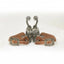 Professional's Choice 50th Anniversary PC 50 Western Spur Set for men. These gunmetal finish spurs feature an elegant swan neck, 6-point rowel, and intricate floral scroll engraving. Accompanied by premium brown leather straps with matching ornate silver buckles, these 3 1/4" width spurs offer a classic, high-performance look for professional riders and western enthusiasts.