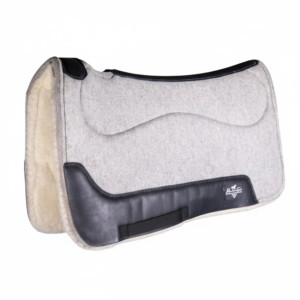 Professional's Choice Precision Relief Deluxe (DLX) Felt Barrel Racing Saddle Pad in gray. This 29" x 30" western saddle pad features a contoured spine, black leather wear leathers, and a plush 1 1/8" Merino wool lining for ultimate shock absorption and comfort. A top-tier choice for barrel racers looking for high-performance horse gear that prevents pressure points and ensures a perfect fit.