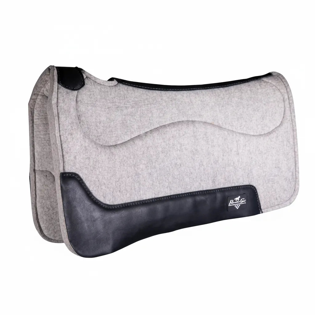Professional's Choice Precision Relief Felt Western Saddle Pad in light grey wool with black leather wear leathers. This contoured orthopedic Air Ride pad is designed for horse comfort and shock absorption. Features reinforced leather along the spine and wear patches for maximum durability. Ideal for Western disciplines, performance, or trail riding, this high-quality grey felt pad ensures a perfect fit and pressure relief for your horse.
