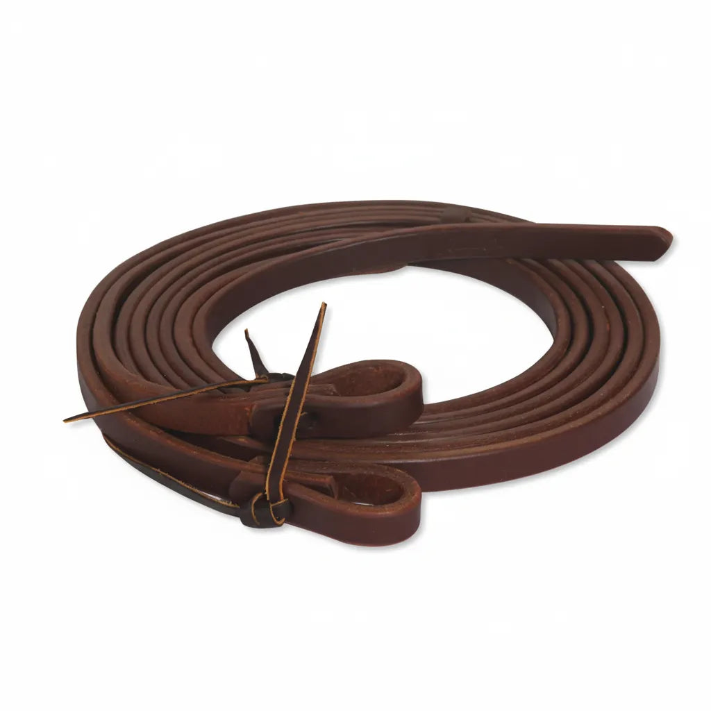Professional's Choice Ranch Heavy Oil Harness Leather Split Reins in a rich dark brown. These 7' 3" weighted tail reins are expertly crafted for balance and durability. Featuring classic tie bit ends, this high-quality western horse tack is coiled to show its supple texture and heavy-duty construction. Ideal for ranch work, performance training, or trail riding.