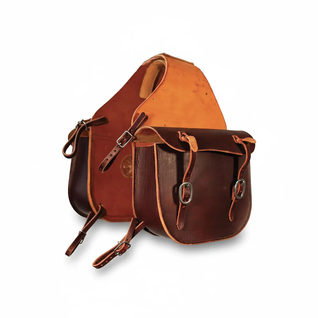 Professional's Choice Large 2-Pocket Saddle Bag in premium two-tone brown heavy-duty leather. This 11" x 12" x 4" universal storage pouch features durable buckle closures and adjustable straps for a secure fit on western saddles. Perfect for trail riding, this rugged equestrian gear offers ample space for gear while maintaining a classic look. A high-quality leather horse tack essential for any rider looking for reliable, stylish storage.