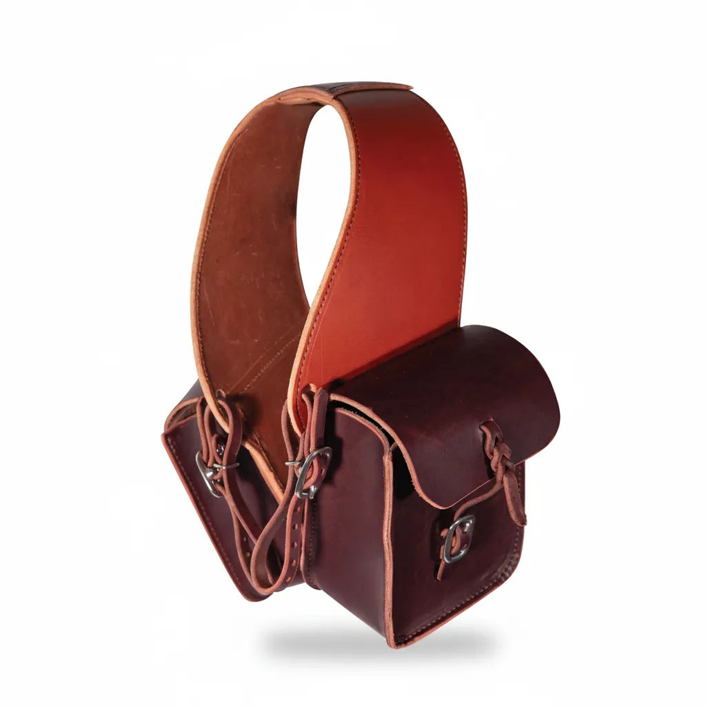 Professional's Choice Burlington Double Pouch Equestrian Saddle Bag in premium Burgundy Latigo Leather. This high-quality pommel bag features two 5.5" x 6.5" x 3" pouches with secure buckle closures and durable leather tie-down straps. Designed for trail riding, this stylish horse gear drapes over the saddle horn to keep essentials accessible. Handcrafted with a rich dark finish and silver hardware, it's a must-have for the organized equestrian.