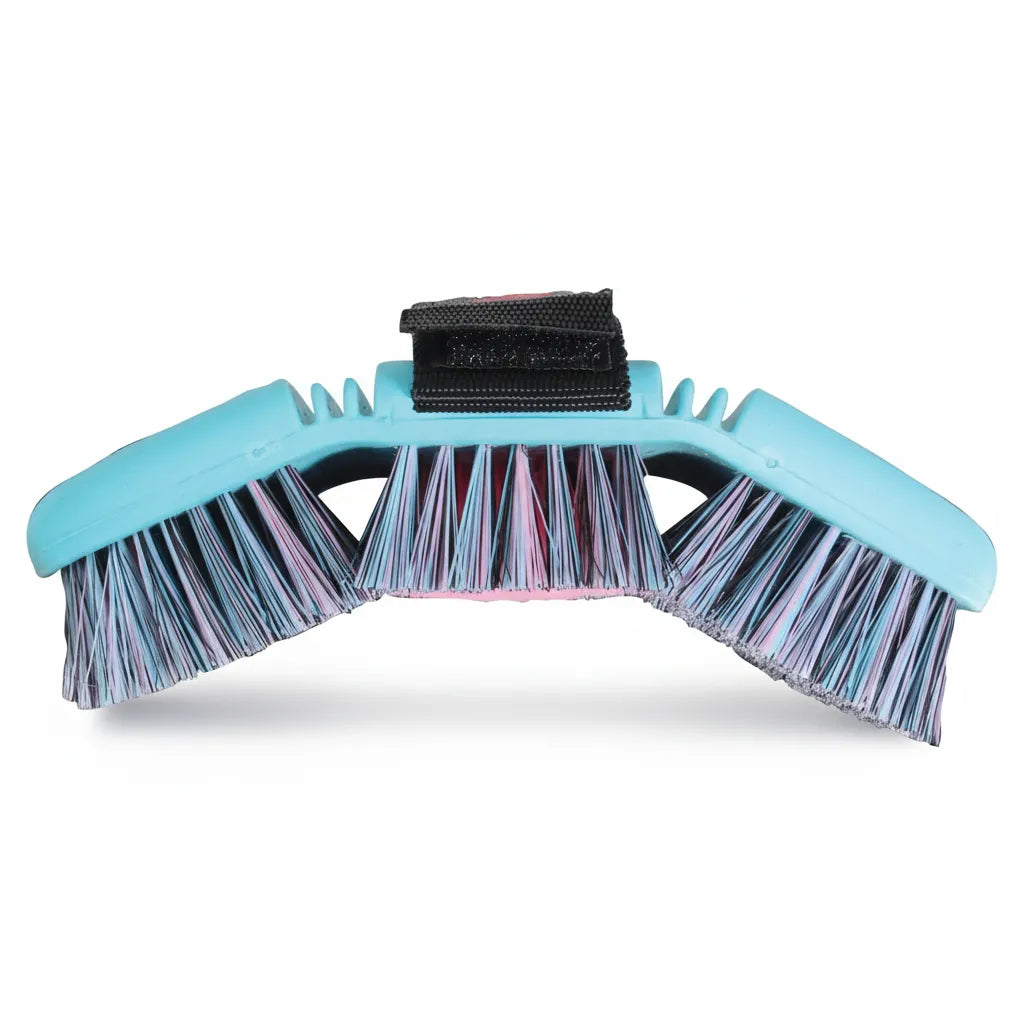 Professional's Choice Tail Tamer Flex Brush in vibrant turquoise, featuring a dual-flex detangler design that contours to the horse for effortless grooming. This three-sectioned equestrian brush has a mix of pink, purple, and blue bristles and an adjustable black Velcro hand strap. Ideal for detangling manes and tails while minimizing hair breakage, this ergonomic grooming tool is a must-have for horse care kits and stable organization.