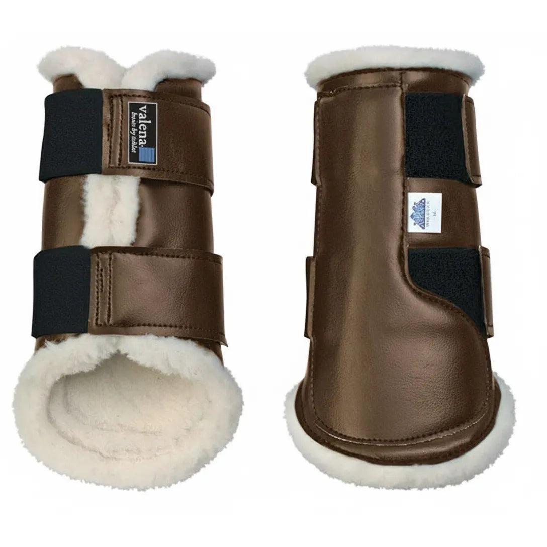 Toklat Valena Horse Boots in metallic brown with plush white WoolBack fleece lining. These durable marine vinyl brushing boots offer superior leg protection and shock absorption. Featuring wide hook-and-loop Velcro straps for a secure, adjustable fit, these stylish equestrian boots are perfect for dressage, jumping, or everyday training. A high-quality choice for horse owners seeking professional performance and classic style in their riding gear.