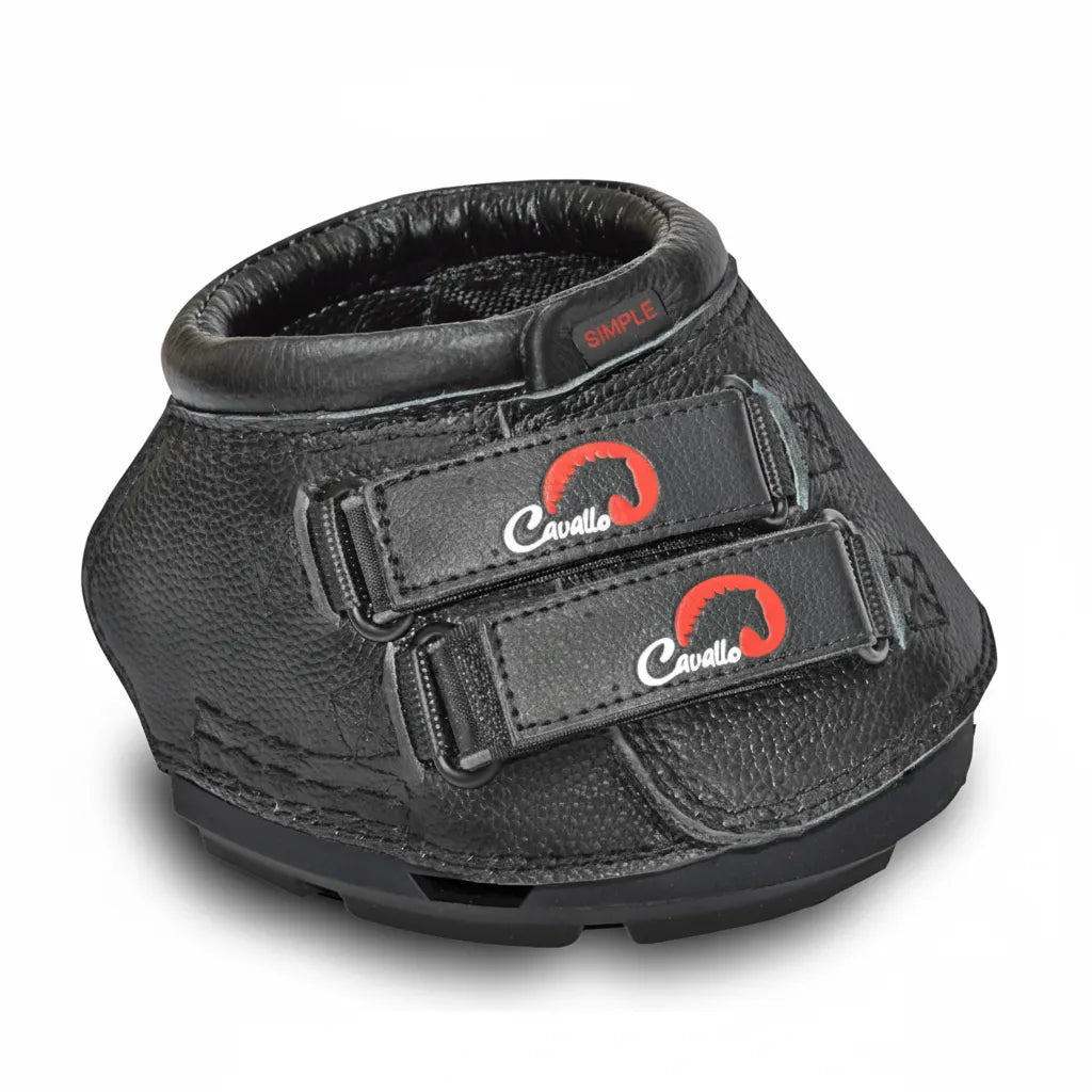 Toklat Cavallo Simple Slim Hoof Boot in black, offering minimalist narrow hoof protection for barefoot horses. This durable leather horse boot features a soft padded collar, shock-absorbing treaded sole, and two adjustable Velcro straps with the iconic red Cavallo logo. A small red "SIMPLE" label sits at the top. Perfect for trail riding or therapeutic use, providing a secure fit and lightweight comfort for your horse's hooves.